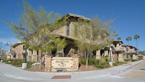 Poway apartment for rent - a building with a sign in front of it