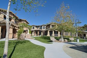 Poway apartment for rent - a group of houses with a walkway and grass