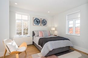 Washington apartment for rent - bedroom with hardwood floors and great natural light