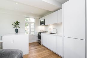 Washington apartment for rent - open kitchen with high end appliances and a breakfast bar