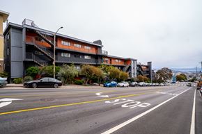 San Francisco apartment for rent - A black car is parked on the side of the road.