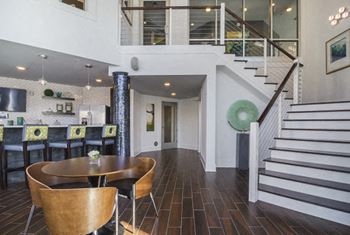 Integrated two-story clubhouse with self-serve barista bar