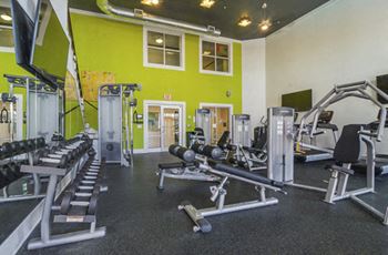 Two-story fitness center with yoga studio and fitness on-demand