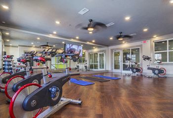 Two-story fitness center with yoga studio and fitness on-demand