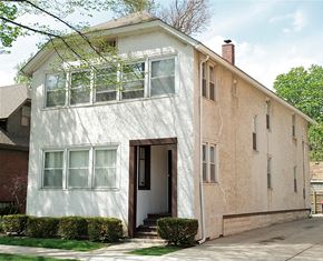Oak Park apartment for rent - the exterior of a white house with a door and windows