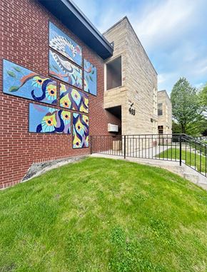 Oak Park apartment for rent - A building with a mural of flowers on the side.