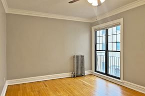 Oak Park apartment for rent - A room with a window and a radiator on the floor.