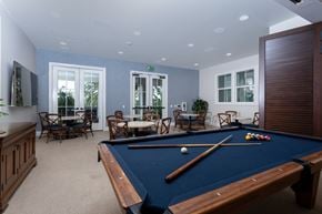 Costa Mesa apartment for rent - A pool table in a room with a view of the outdoors.
