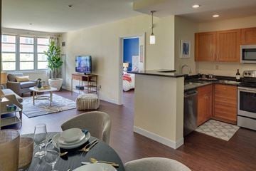 Medford apartment for rent - a kitchen and living room with a table and chairs
