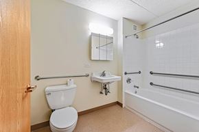 Chicago apartment for rent - a bathroom with a toilet and a tub and a sink