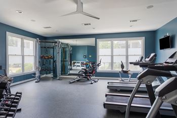 New 24-hour fitness studio with matrix spin bikes and trx suspension training