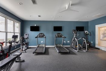 New 24-hour fitness studio with matrix spin bikes and trx suspension training