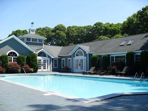 Groton apartment for rent - a swimming pool in front of a house