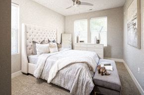 Lincoln apartment for rent - a bedroom with a bed and a dresser