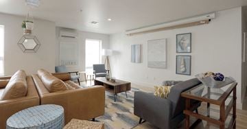Atlantic City apartment for rent - a living room with a couch and a table
