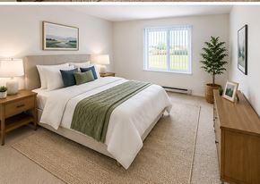 Madison Heights apartment for rent - A bedroom with a large bed and a small tree.