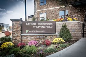 Newark apartment for rent - exterior of entrance with building sign that states "Senior Residences at Springfield; an RPM Community"