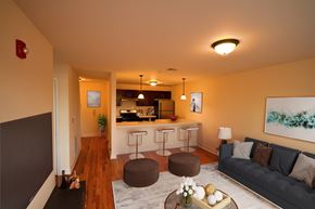 Woodbury apartment for rent - GG Green Living Room and Kitchen with modern furniture and open layout