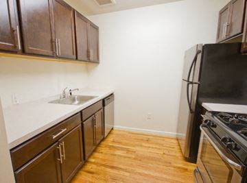 Newark apartment for rent - a kitchen with a stove refrigerator and a sink
