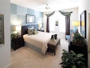Brookfield apartment for rent - a bedroom with a bed and a couch in it