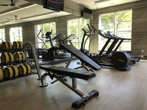 Hastings-On-Hudson apartment for rent - a gym with cardio equipment and weights in it