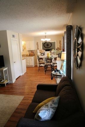 Jackson townhouse for rent - a living room with a couch and a dining room