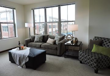 Brookfield apartment for rent - a living room with a couch and a chair and a table