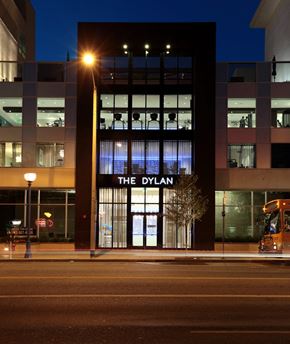 West Hollywood apartment for rent - The Dylan is a modern building with a large glass window.