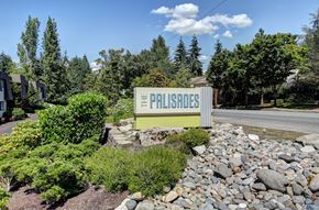 Bellevue apartment for rent - A sign that says "The Pillars" in front of a building.