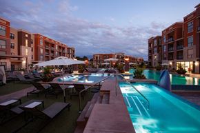 Overland Park apartment for rent - Royale pool and spa at dusk at The Royale at CityPlace, Overland Park, KS