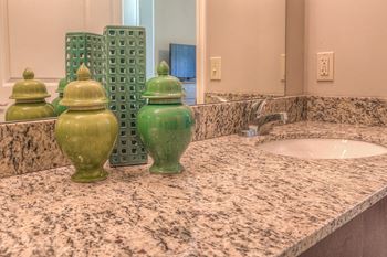 Designer granite countertops in all bathrooms