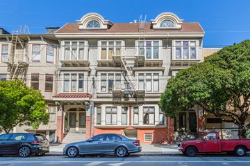 San Francisco apartment for rent - A row of houses with cars parked in front.