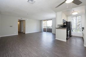 Los Angeles apartment for rent - an empty living room and kitchen with wood floors