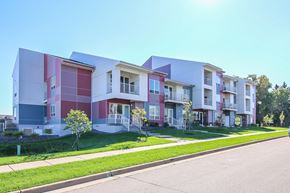 Madison apartment for rent - a row of apartment buildings on the side of a street