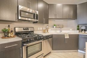 Madison apartment for rent - a kitchen with stainless steel appliances and a microwave