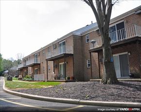 Allentown apartment for rent - Apartment building with a tree in front.