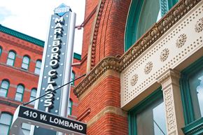 Baltimore apartment for rent - a sign on the side of a red brick building