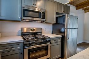 Los Angeles apartment for rent - a kitchen with stainless steel appliances and a refrigerator