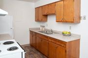 Bloomington apartment for rent - a kitchen with a stove and a sink