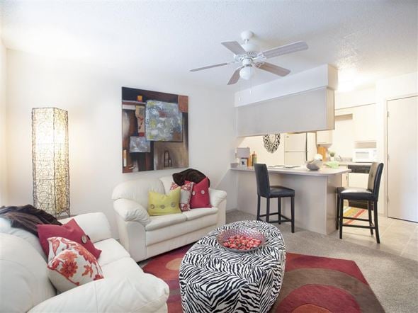 Conway apartment for rent - a living room with a couch and a ceiling fan