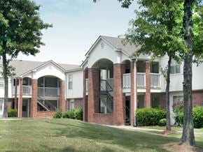 Conway apartment for rent - an exterior view of a building with trees