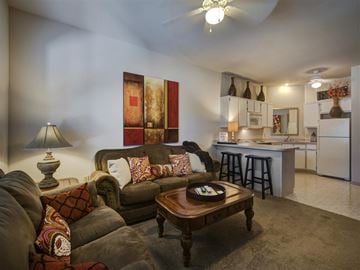 Fayetteville apartment for rent - a living room with a couch and a table
