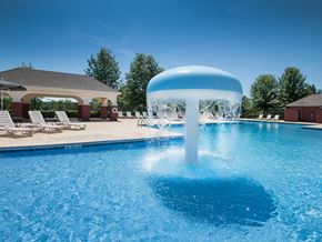 Canton apartment for rent - a water feature in the middle of a swimming pool with a fountain