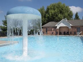 Bentonville apartment for rent - a water fountain in the middle of a pool