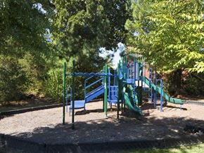 Fayetteville apartment for rent - a playground with a slide in a park