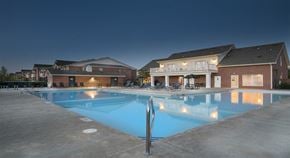Conway apartment for rent - a large swimming pool in front of a building
