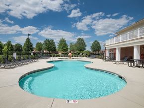 Canton apartment for rent - our resort style swimming pool is next to our building and has lounge chairs