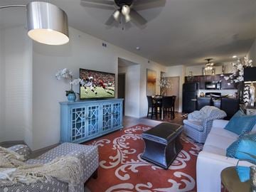 Bentonville apartment for rent - a living room with a couch and a tv