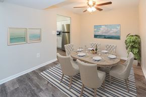 Nottingham apartment for rent - a dining room with a table and chairs