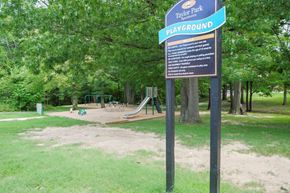 Nottingham apartment for rent - a sign for a playground in a park